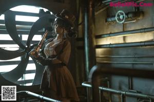 A naked woman in a steampunk outfit posing for the camera.