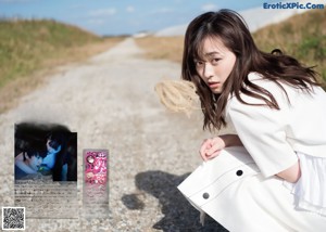 A magazine with a picture of a woman on the cover.