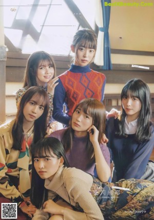 A group of young women posing for a photo together.