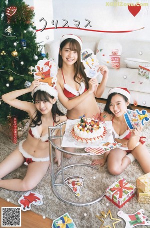 A group of three young women in a swimming pool.